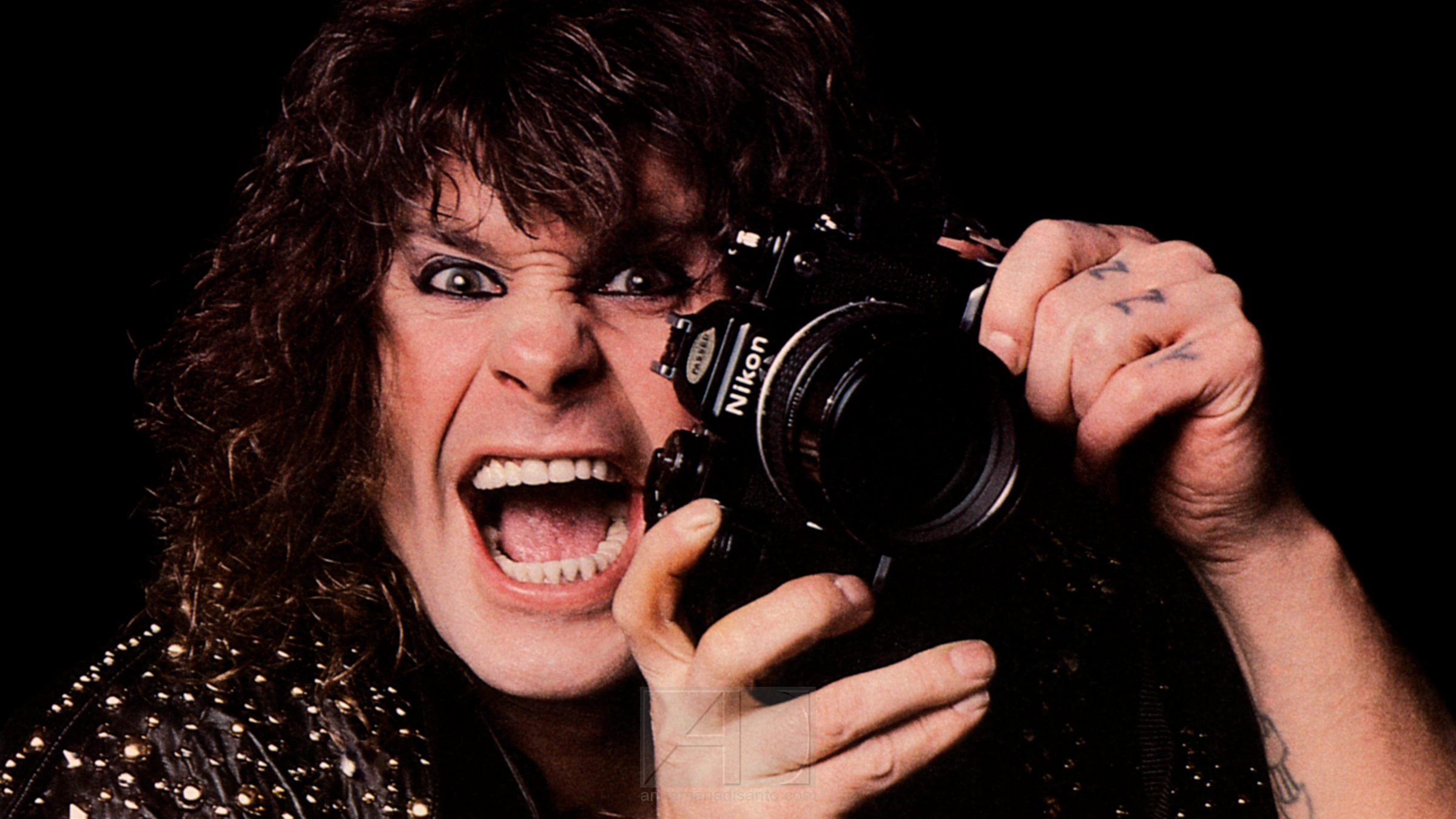 Ozzy Osbourne holding camera by Annamaria DiSanto Photographer