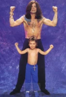 Ozzy Osbourne with his son Jack in a private studio portrait, circa 1991, photographed by Annamaria DiSanto