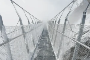 Titlis Cliff Walk suspension bridge in the Swiss Alps, photographed by Annamaria DiSanto