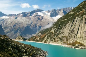Lake Gelmer (Gelmersee) surrounded by the Swiss Alps in Guttannen, Switzerland, photographed by Annamaria DiSanto