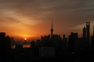 Sunrise over the Pudong skyline with the Oriental Pearl Tower in Shanghai, China, photographed by Annamaria DiSanto Sunrise over the Pudong skyline with the Oriental Pearl Tower in Shanghai, China, photographed by Annamaria DiSanto